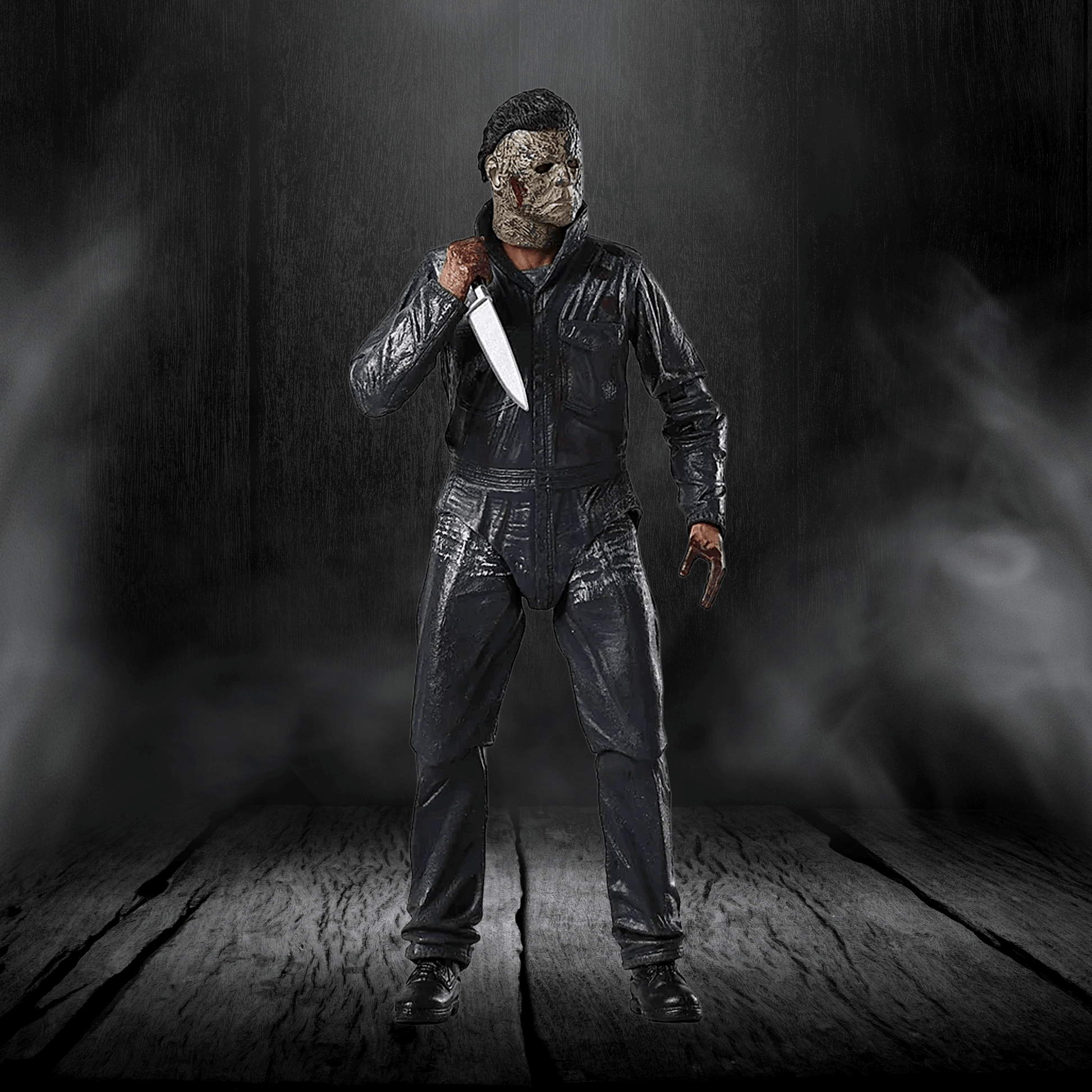 Person in a dark costume holding a knife against a dark background