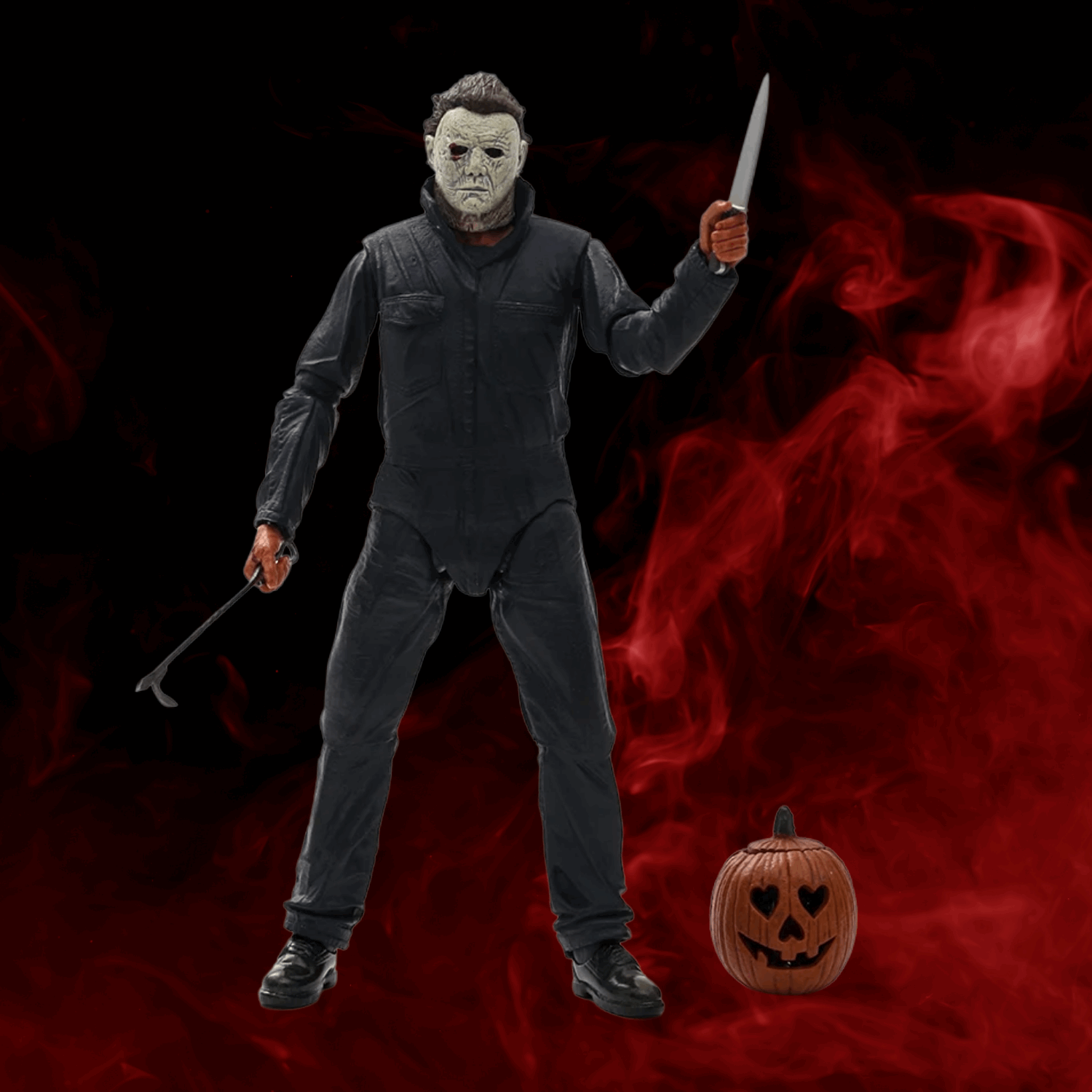 Action figure with a mask and knife against a dark background with red smoke and a pumpkin.