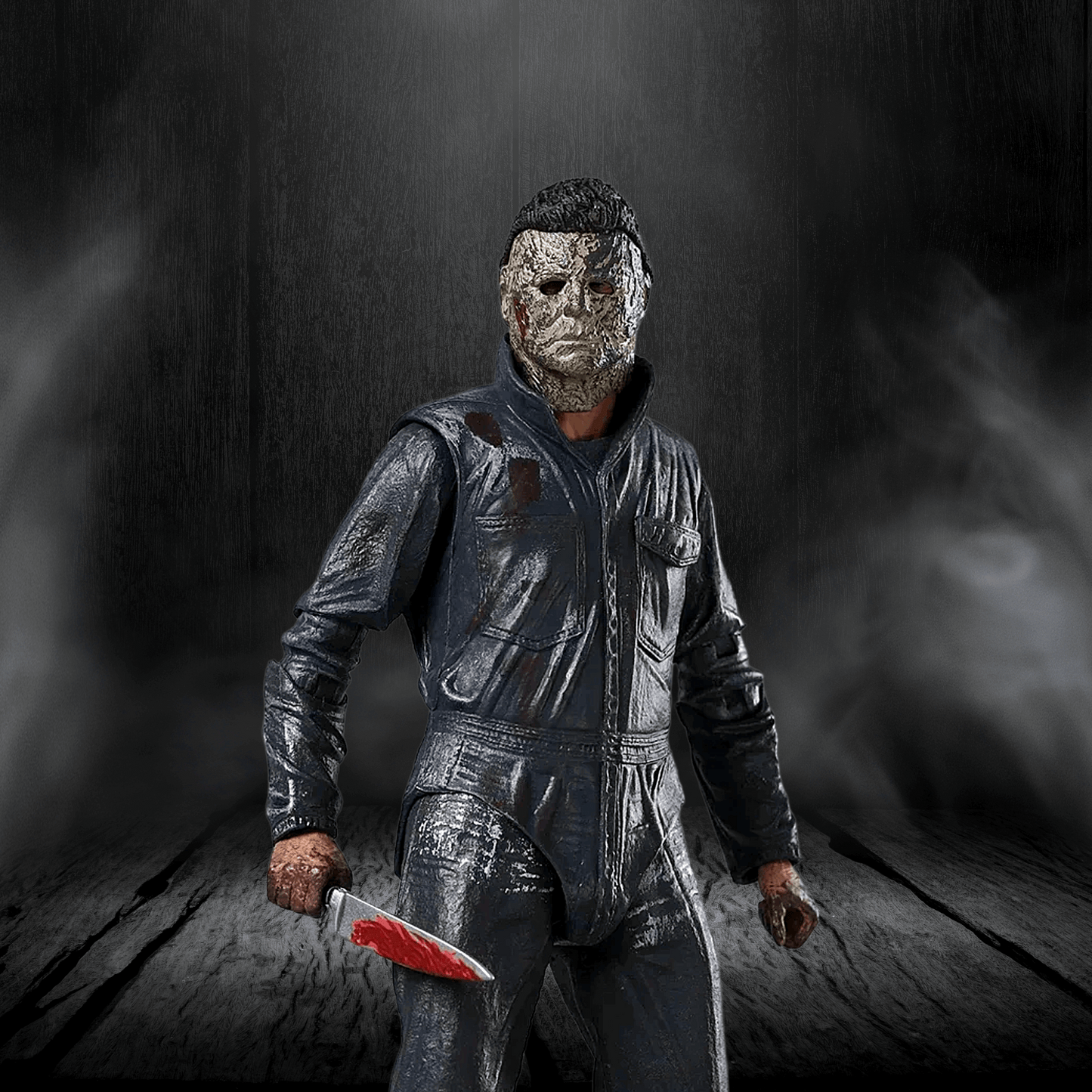 Person in a horror-themed costume holding a knife against a dark background