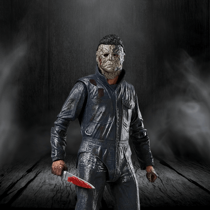 Person in a horror-themed costume holding a knife against a dark background