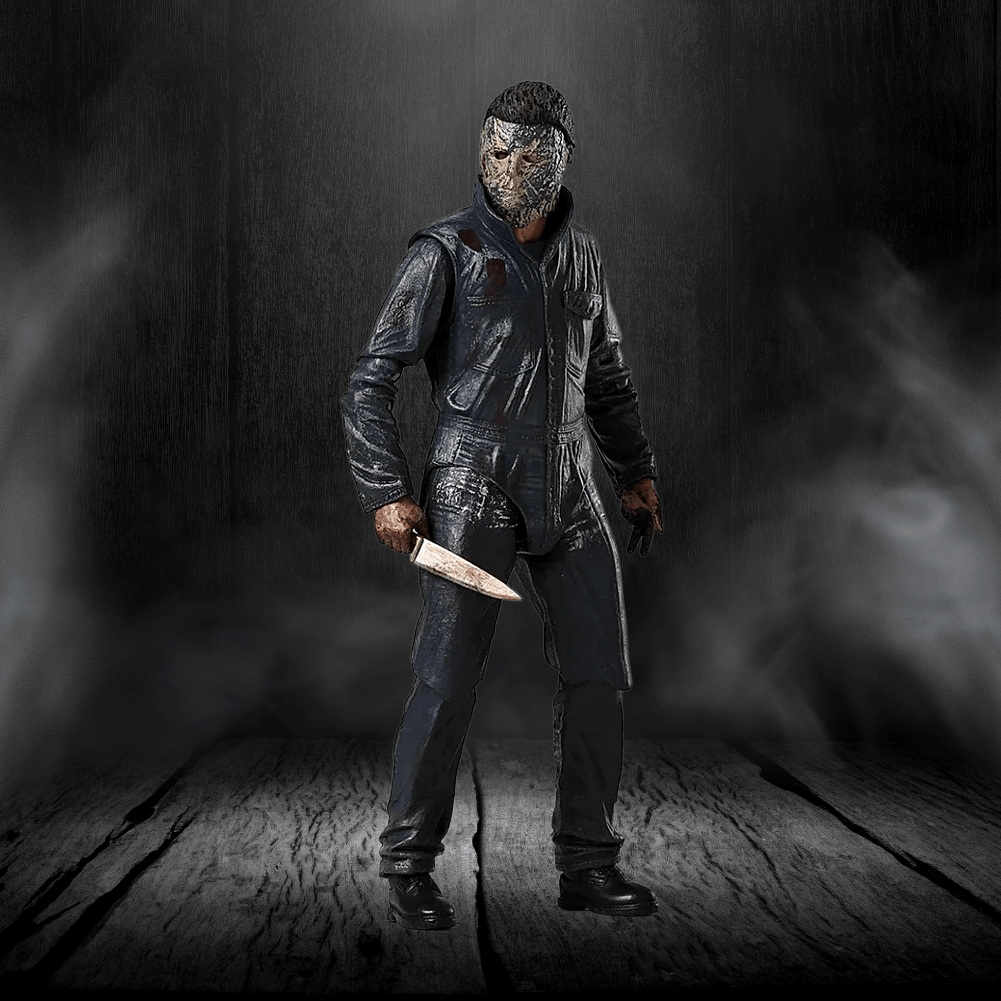 Person wearing a dark outfit and mask holding a knife in a dark, smoky setting