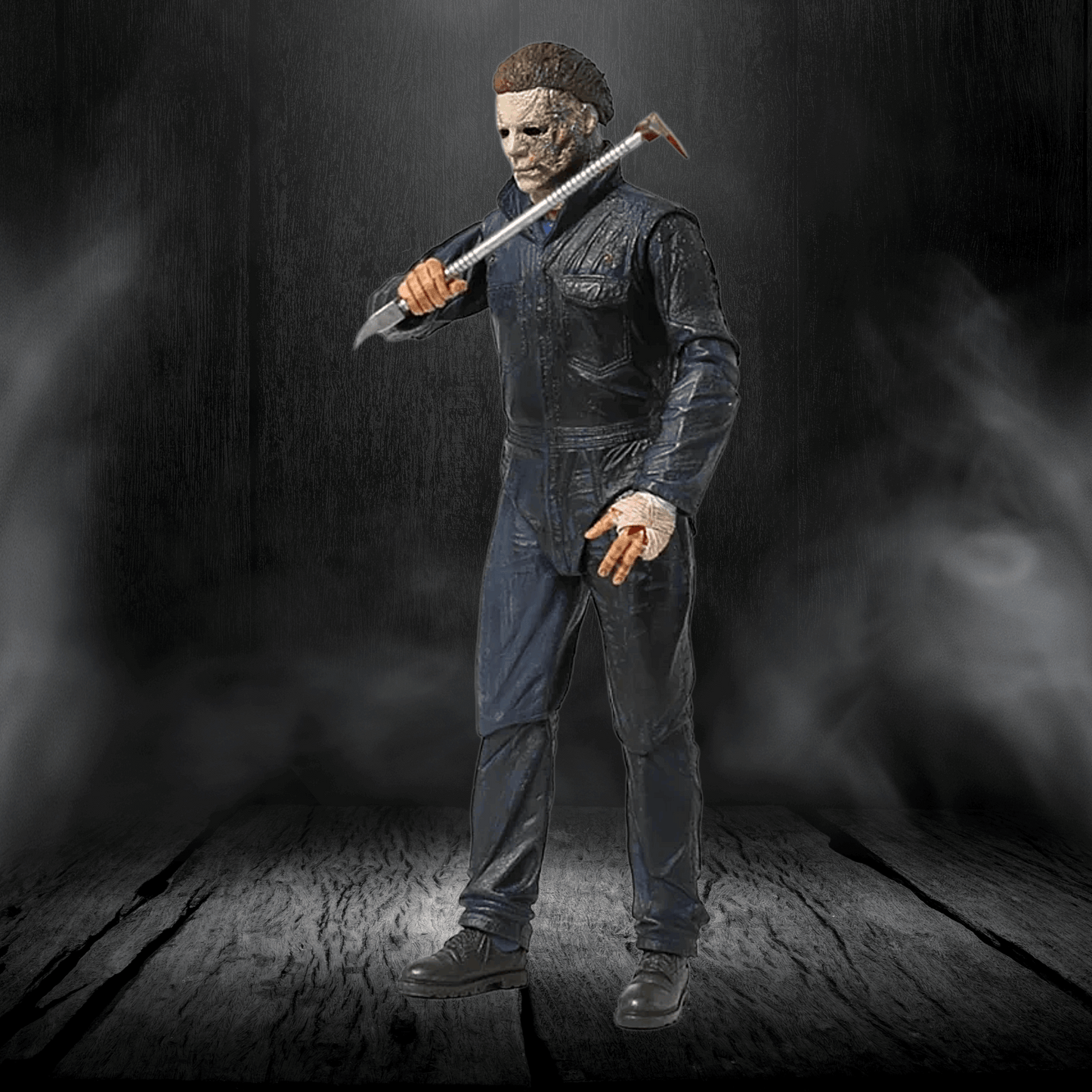 Action figure in a dark setting holding a weapon