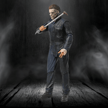 Action figure in a dark setting holding a weapon