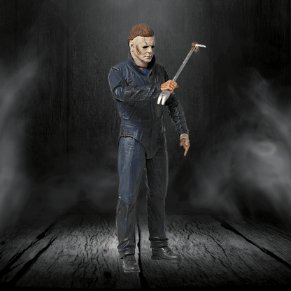 Action figure in a dark setting holding an axe