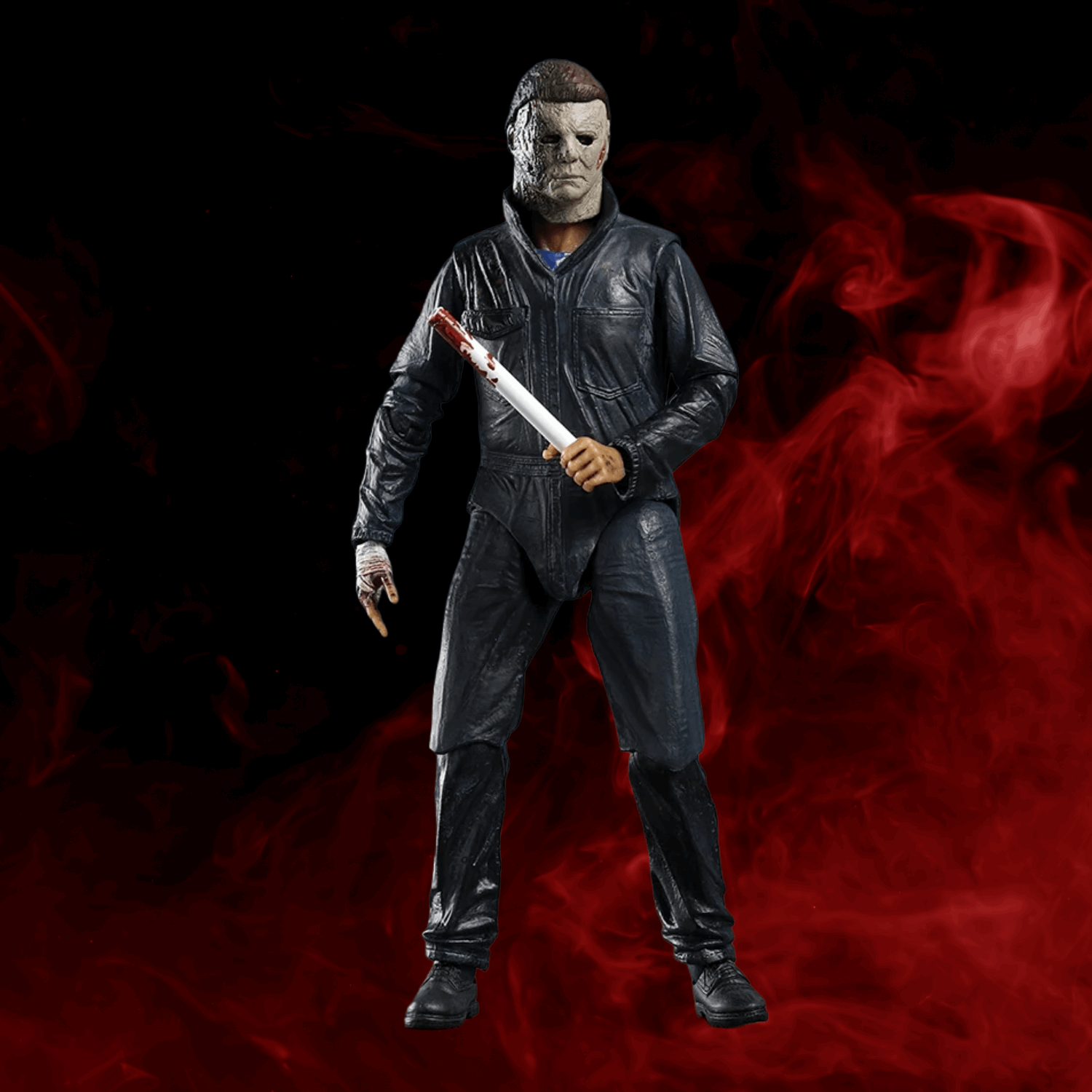 Action figure in a dark suit with a knife against a red and black background