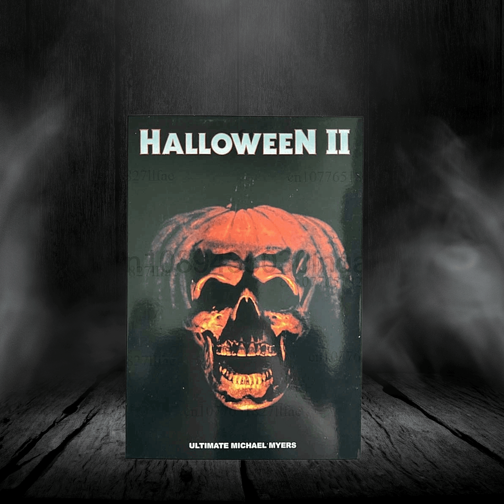 Movie poster for 'Halloween II' with a glowing pumpkin face on a dark background