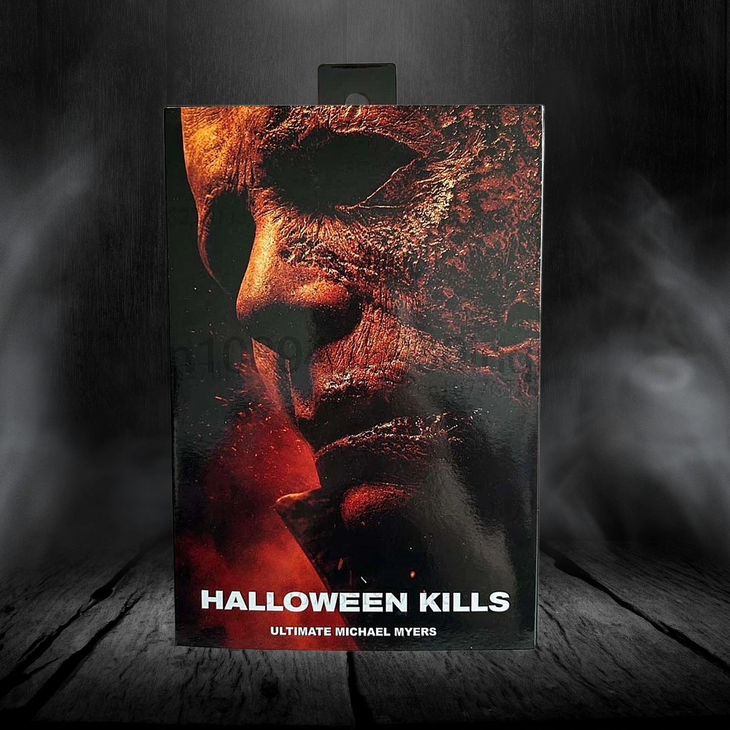 Halloween Kills poster with Michael Myers mask on a dark background