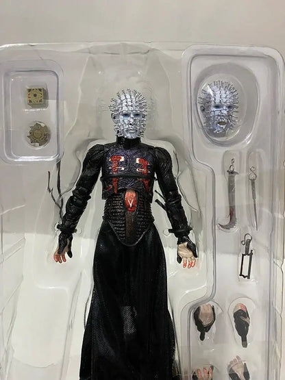 Action figure in a clear packaging case with additional accessories.