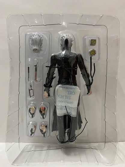 Action figure in clear packaging with visible branding on a white background