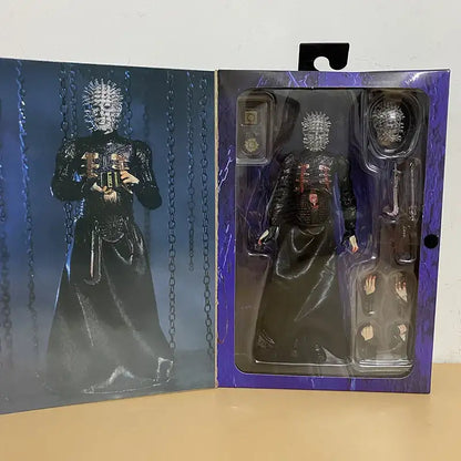 Action figure in packaging with a detailed costume and helmet, on a plain background.