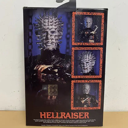 Boxed Hellraiser toy figure with detailed design on a white background
