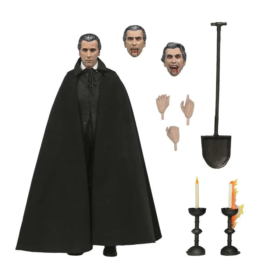 Action figure with black cape and accessories on a white background