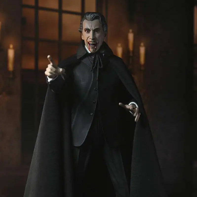 Figure in a dark coat with a cape, holding a cane in a dramatic pose against a candlelit background.