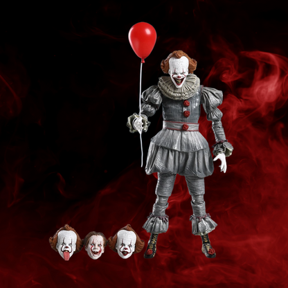 Action figure of a clown with a red balloon on a dark background