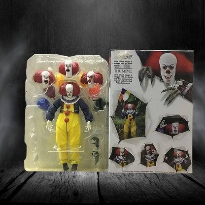 Action figure of a clown in packaging with promotional material on a dark background