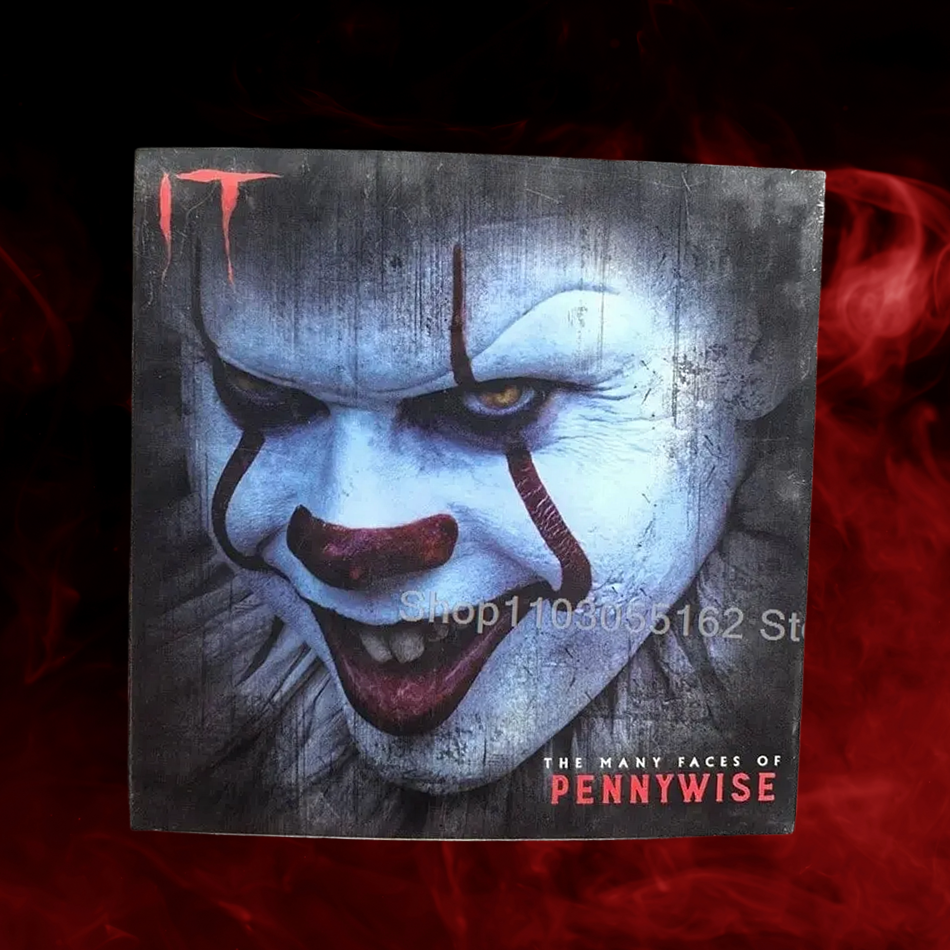 Book cover of 'The Many Faces of Pennywise' with a clown face design on a dark background.