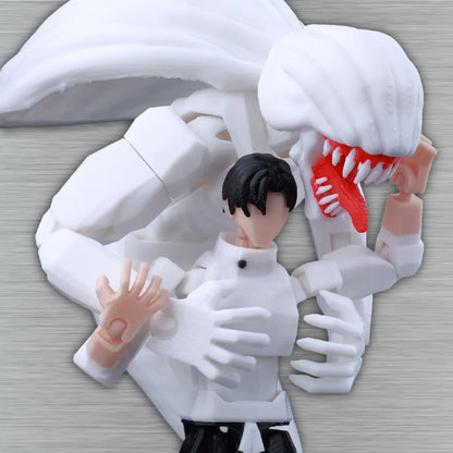 Action figure with a white suit and red mouth, lying on a textured surface.