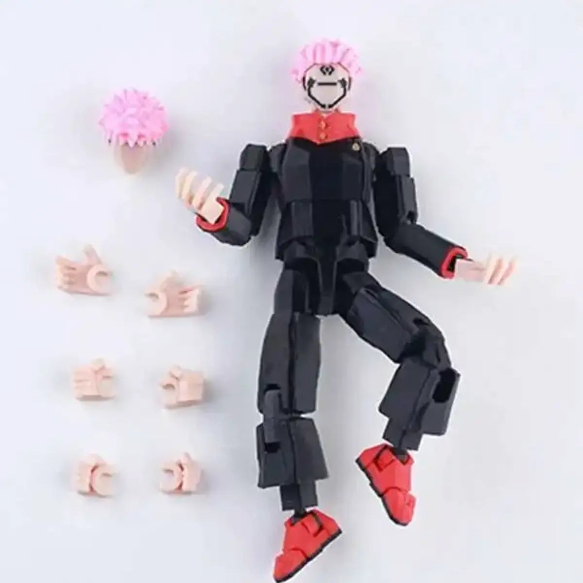 Black and red action figure with pink hair on a white background
