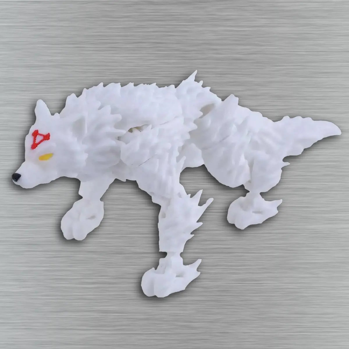 White wolf-shaped object with red and yellow markings on a gray background
