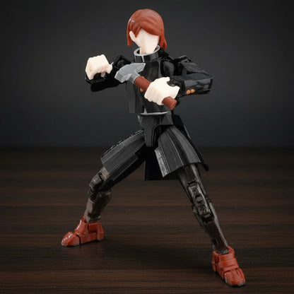 Action figure with red hair and black outfit on a textured gray background