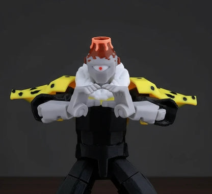 Toy figure with a yellow and black weapon on a textured gray background