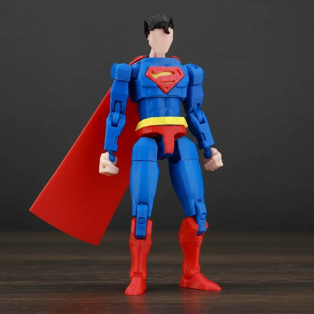 Superman action figure with red cape on a textured gray background