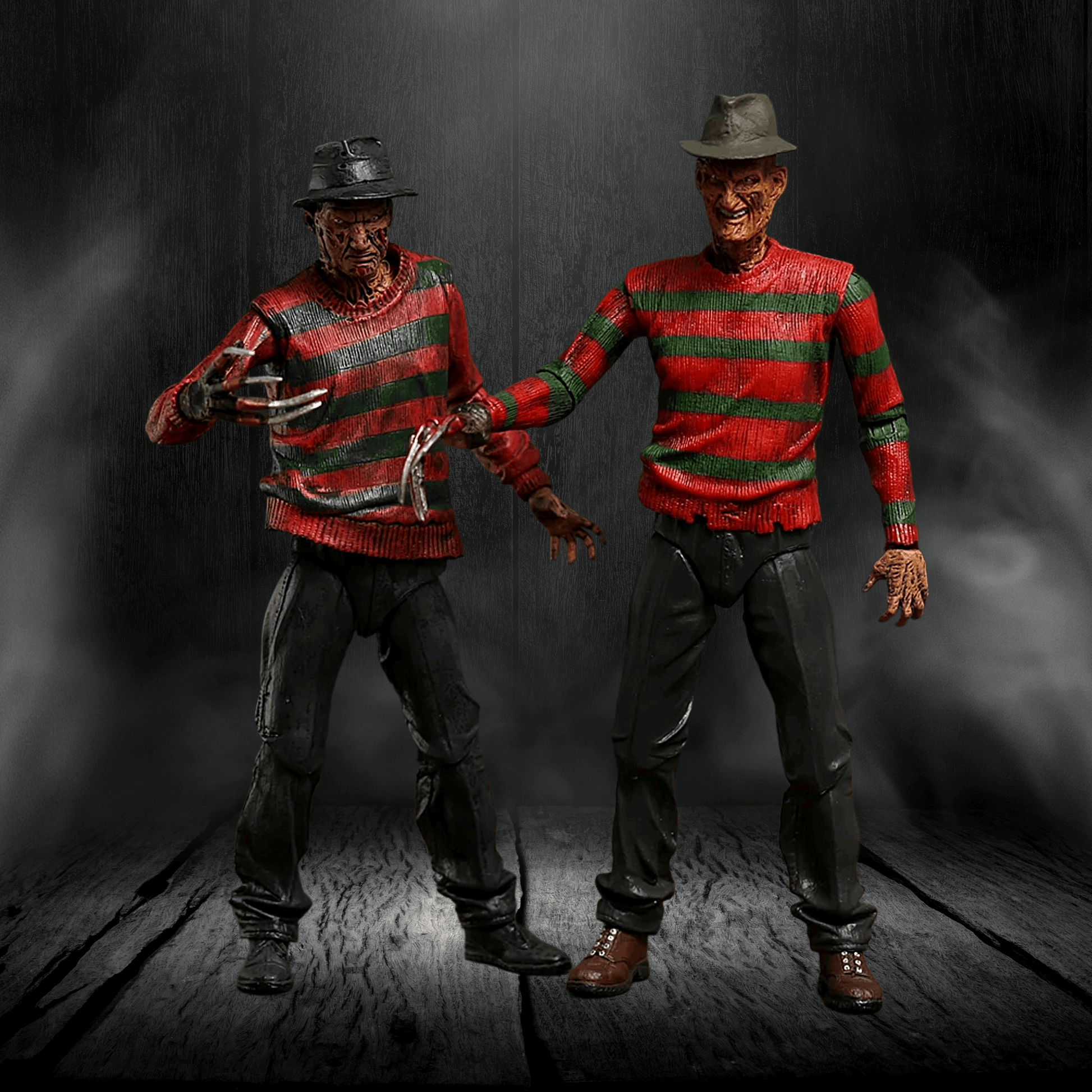 Two action figures of a character in a red and green striped sweater against a dark background.