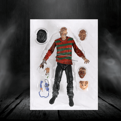 Action figure in a red sweater with multiple heads and props on a dark background