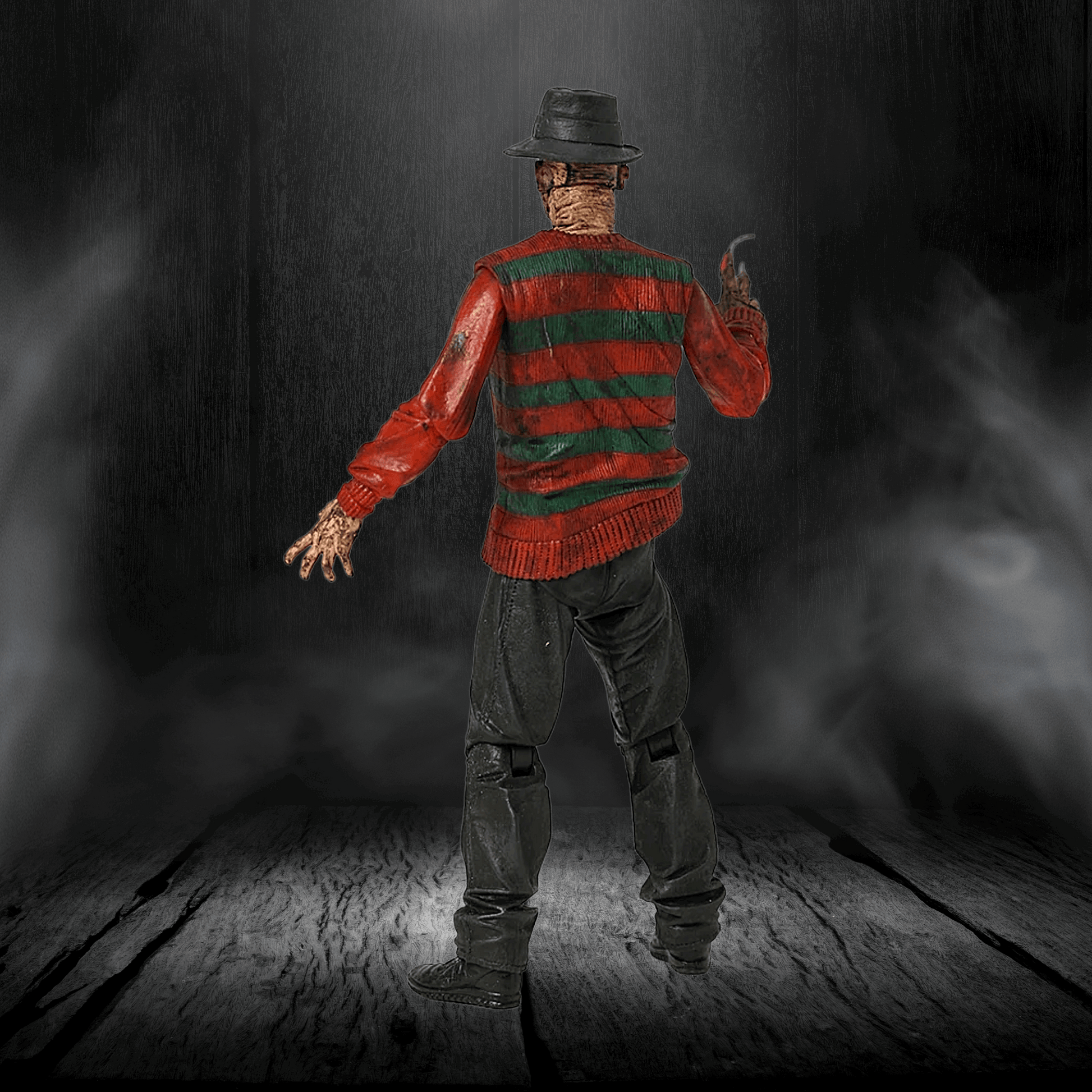 Character in a red and green striped sweater with a hat, holding a knife, on a dark background.