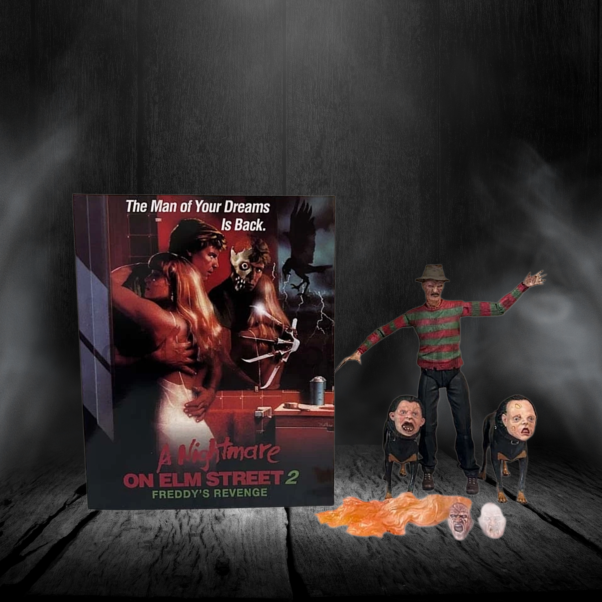 Movie poster for 'A Nightmare on Elm Street 2' with action figures on a dark background