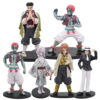 Set of six colorful figurines on black stands against a white background