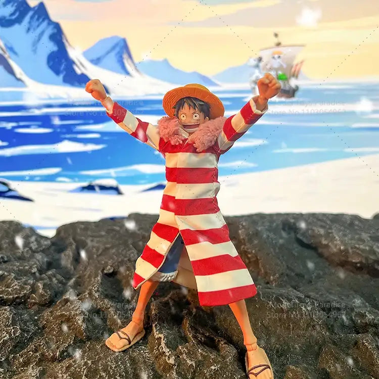 Action figure of a character in a red and white striped outfit standing on a rocky surface with a scenic background.