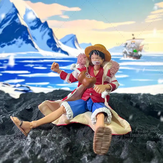 Action figure of a character from a popular anime series sitting on a rock with a scenic background.