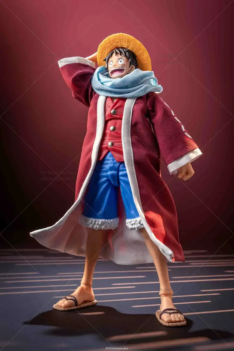 Action figure of a character in a red coat and yellow hat against a dark background