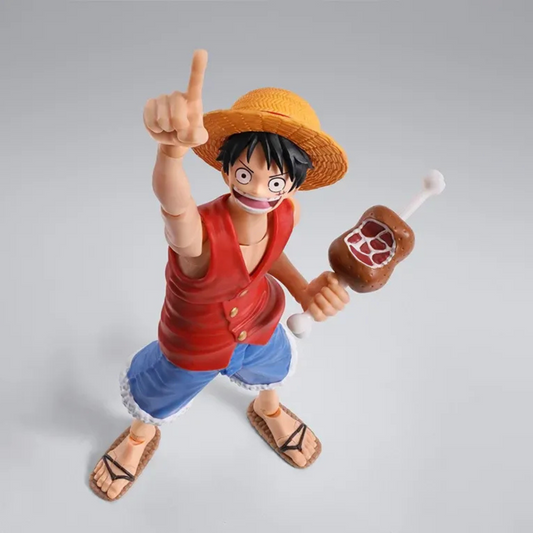 Action figure of a character from an anime series on a gray background