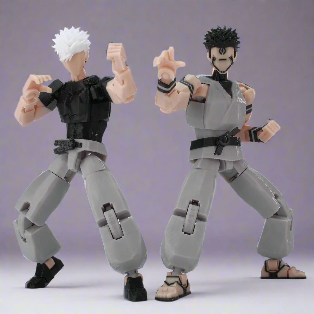 Two action figures in dynamic poses on a white background with a brand logo in the corner.