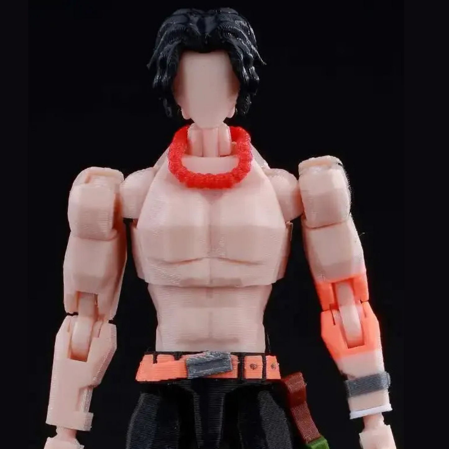 Action figure with a red choker on a black background