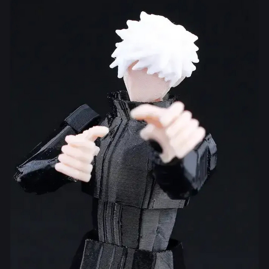 Action figure with white hair and black outfit on a black background