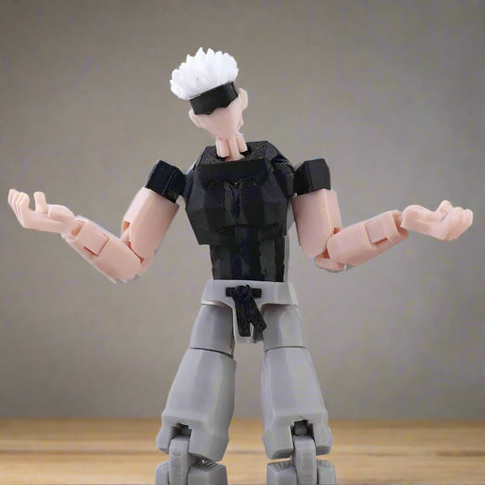 Action figure with a black and gray outfit on a white background