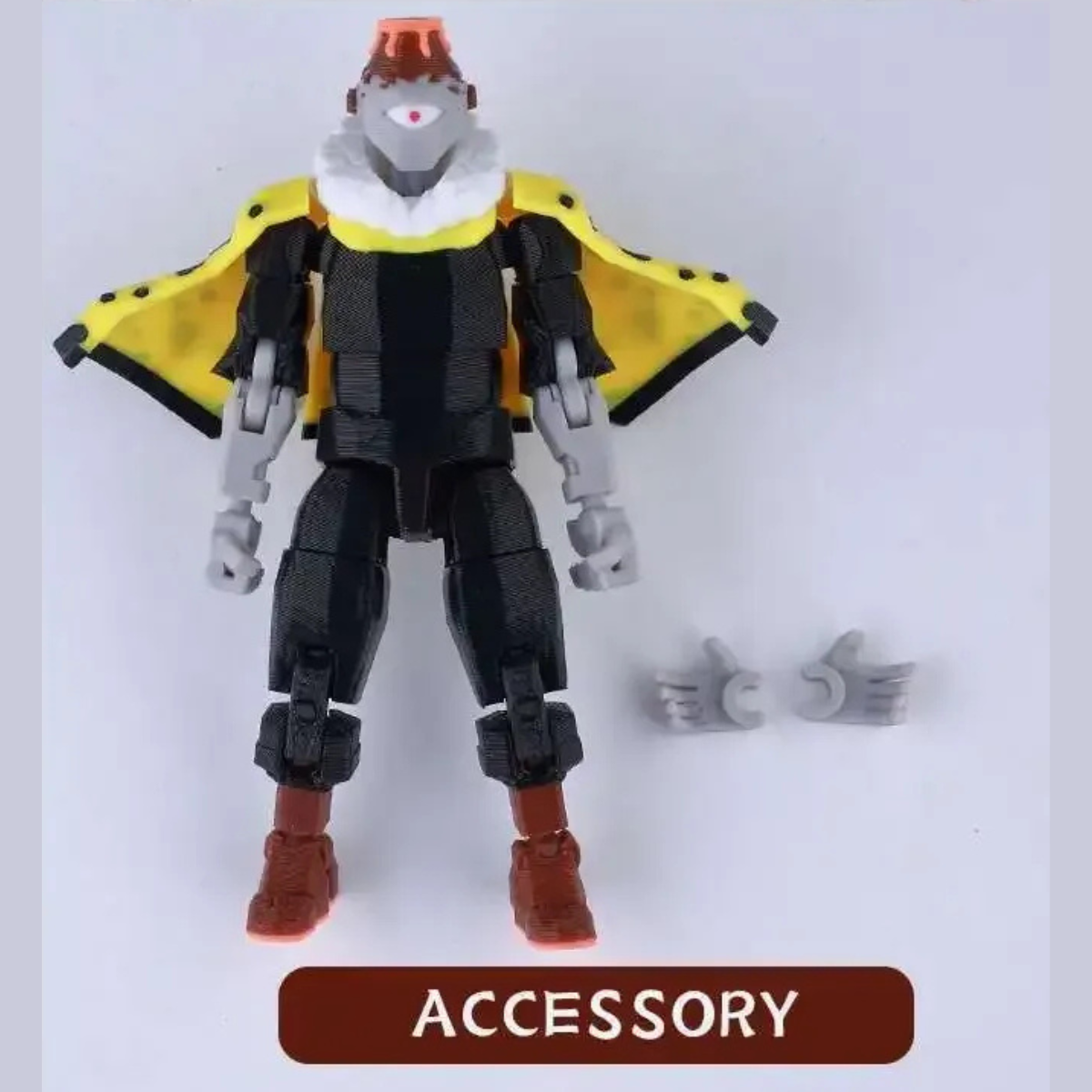 Action figure with a yellow cape and red boots on a white background