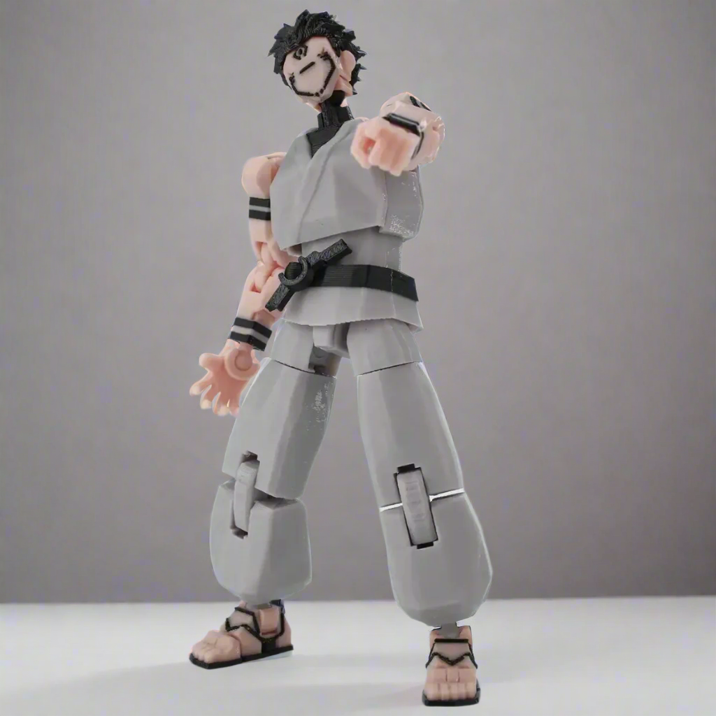 Action figure in gray outfit with black accents on a white background