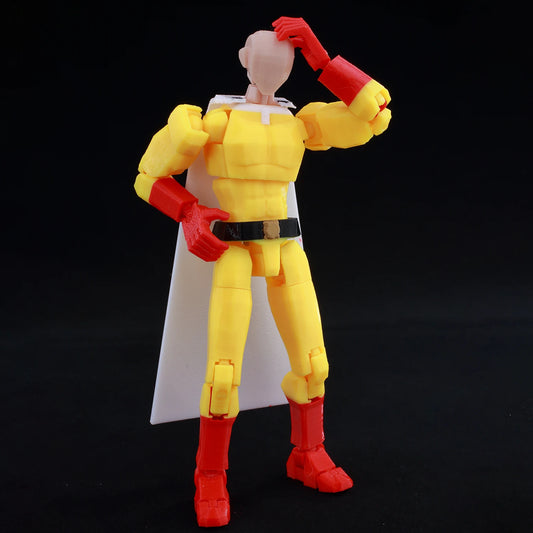 Action figure with yellow and red costume on a black background