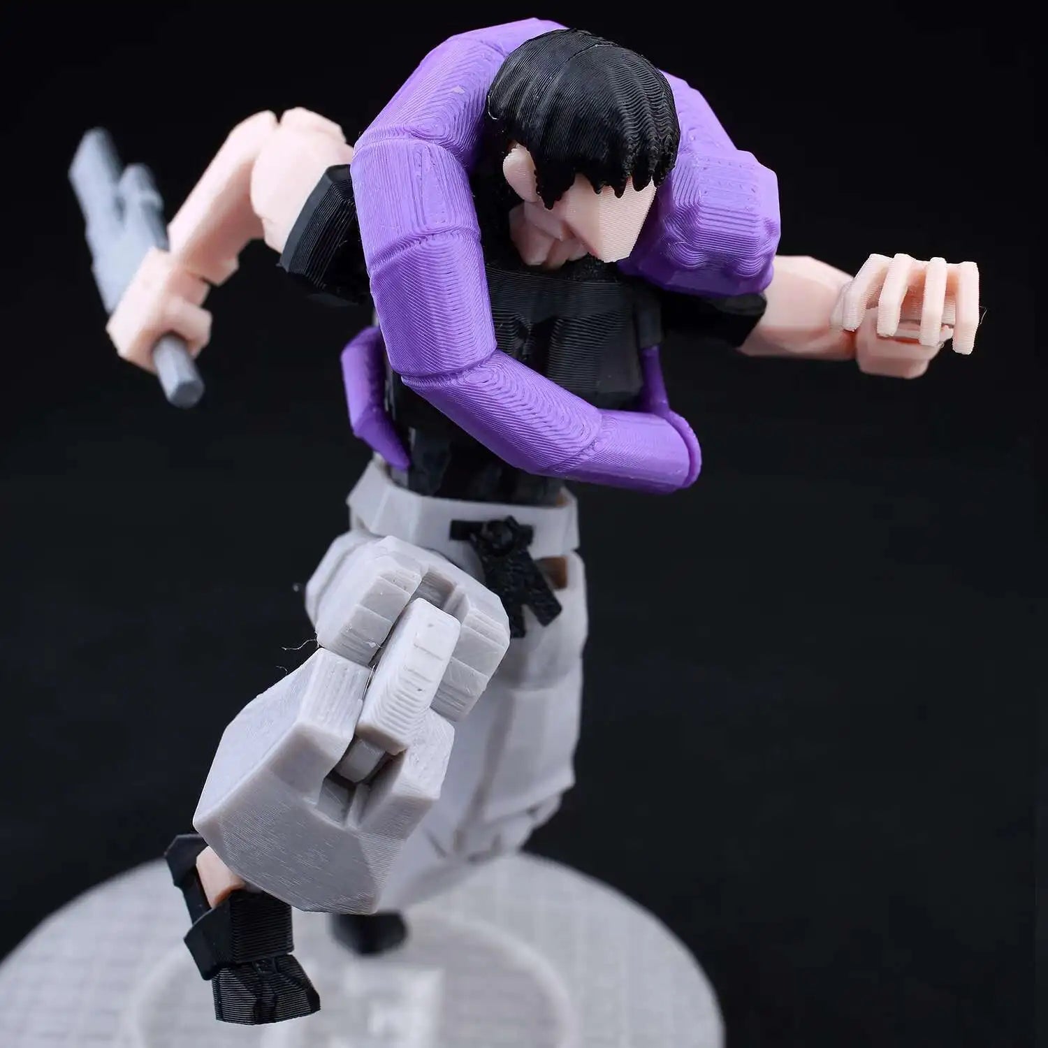 Action figure in a dynamic pose with a black background