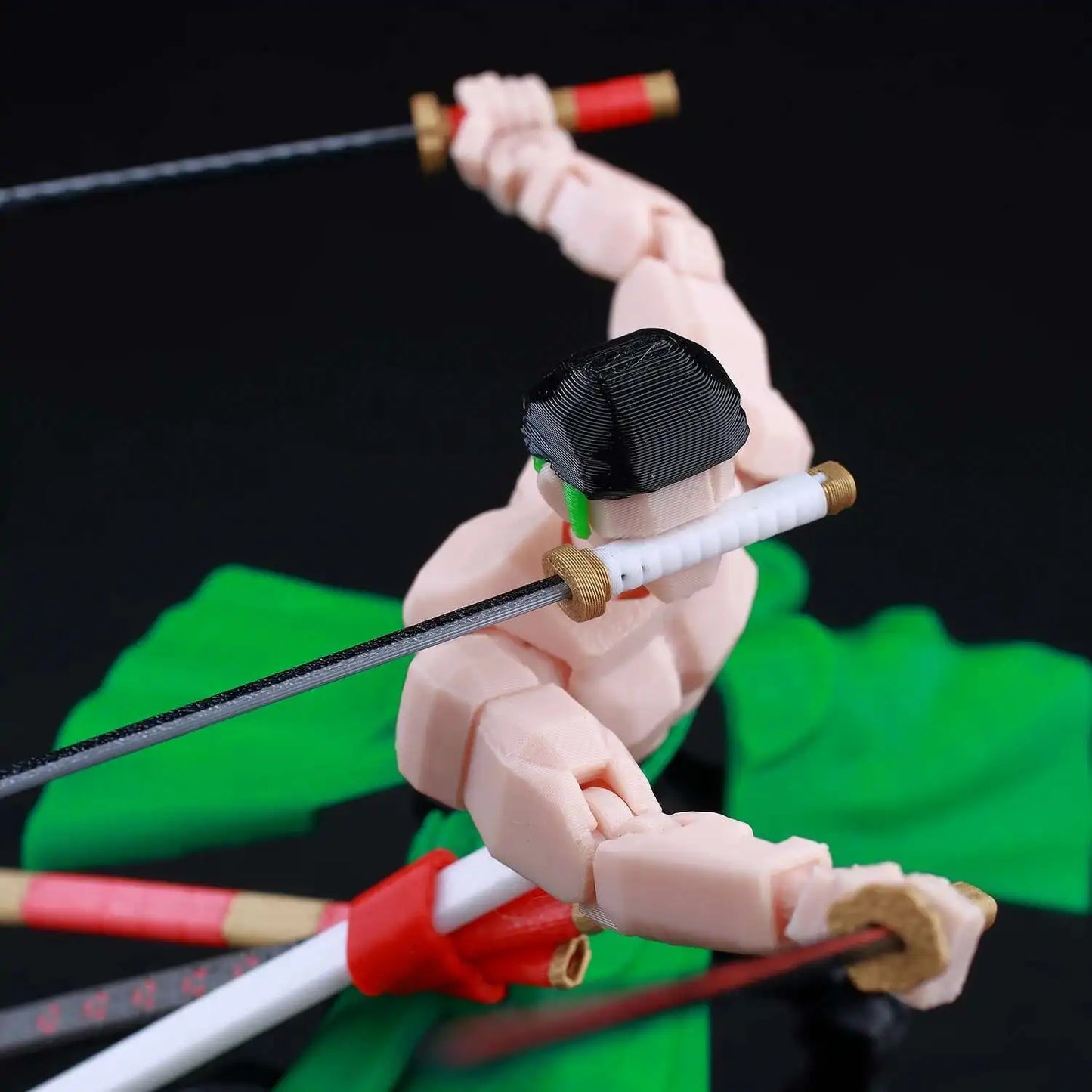 Action figure of a character with multiple bows and arrows on a black background