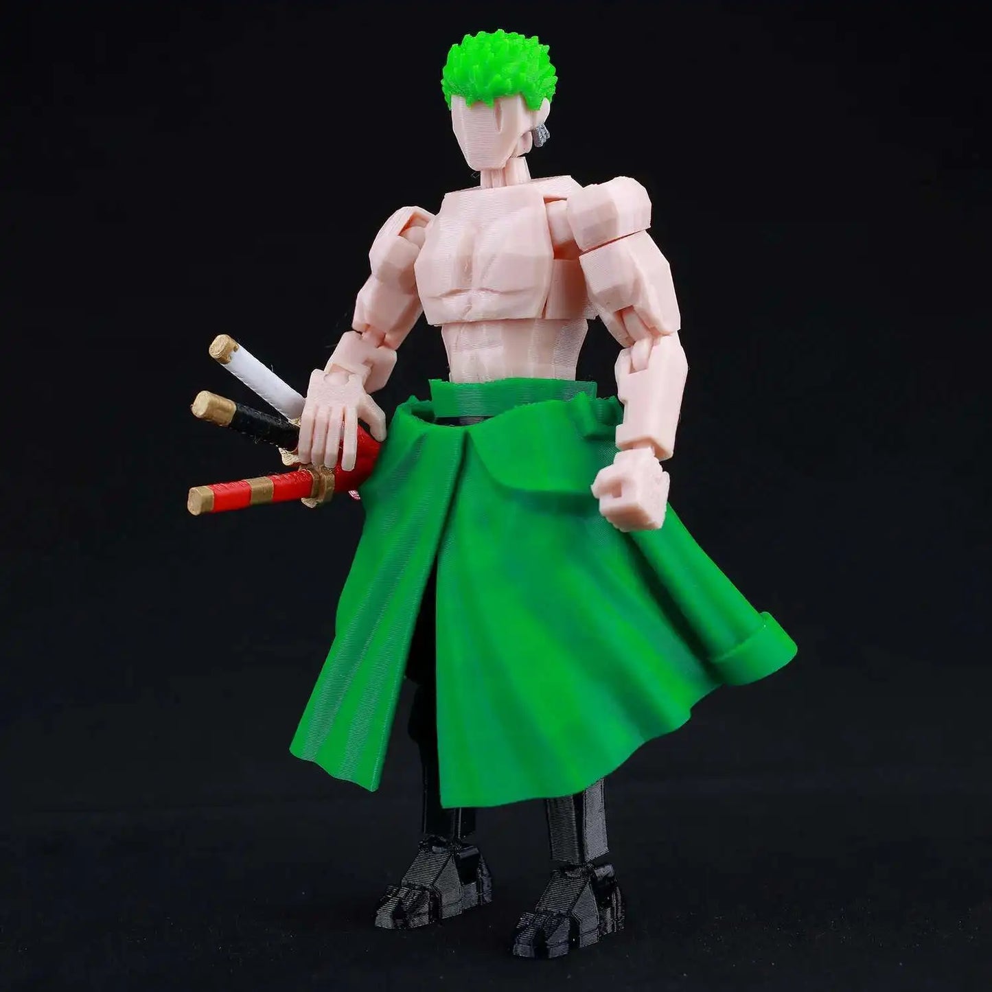 Action figure with green hair and green cloth on a black background