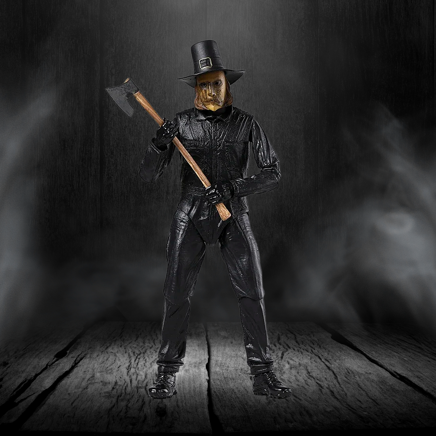 Person in black leather outfit with axe against a dark background
