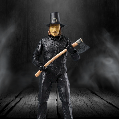 Action figure in a dark costume holding an axe against a dark background