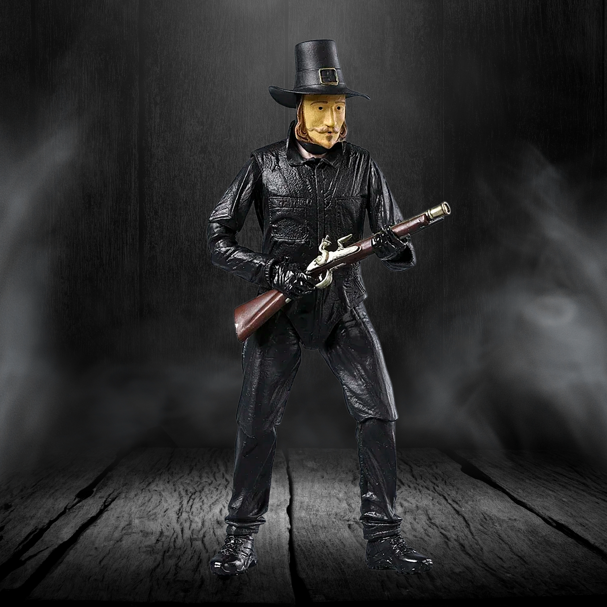 Figure in a black leather outfit with a hat holding a rifle against a dark background