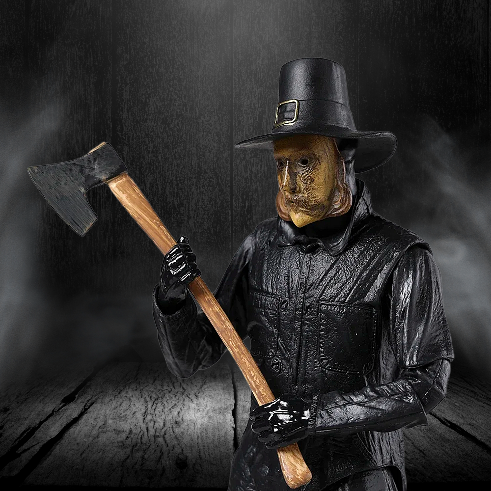 Person wearing a wooden mask and black outfit holding an axe against a dark background