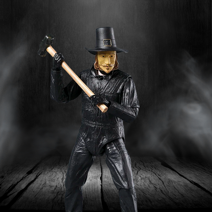 Figurine of a man in black attire holding an axe against a dark background